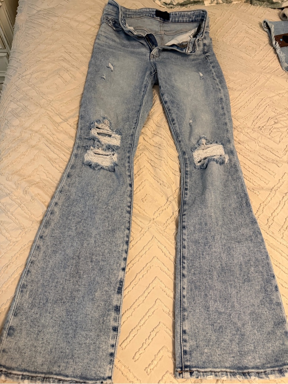 Buckle Light Blue High-Rise Distressed Flare Jeans (A)
